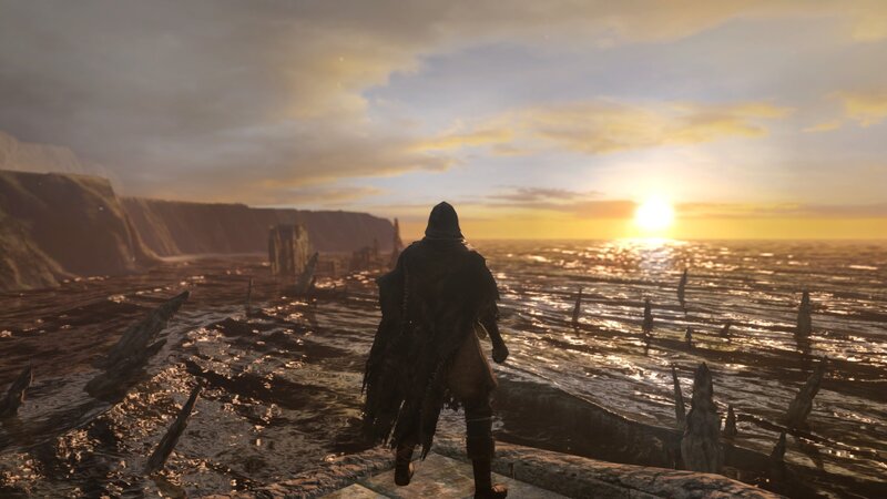 Hooded Figure on Shore