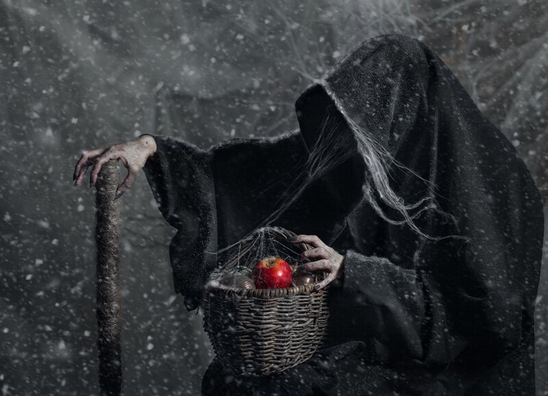Hooded Figure with Basket