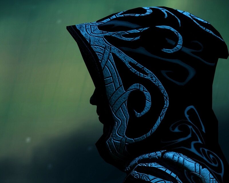 hooded figure with blue patterns