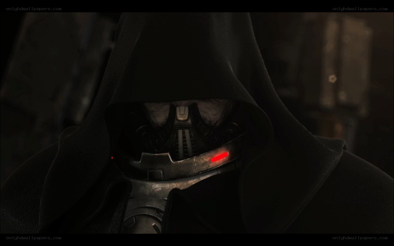 hooded figure with red light