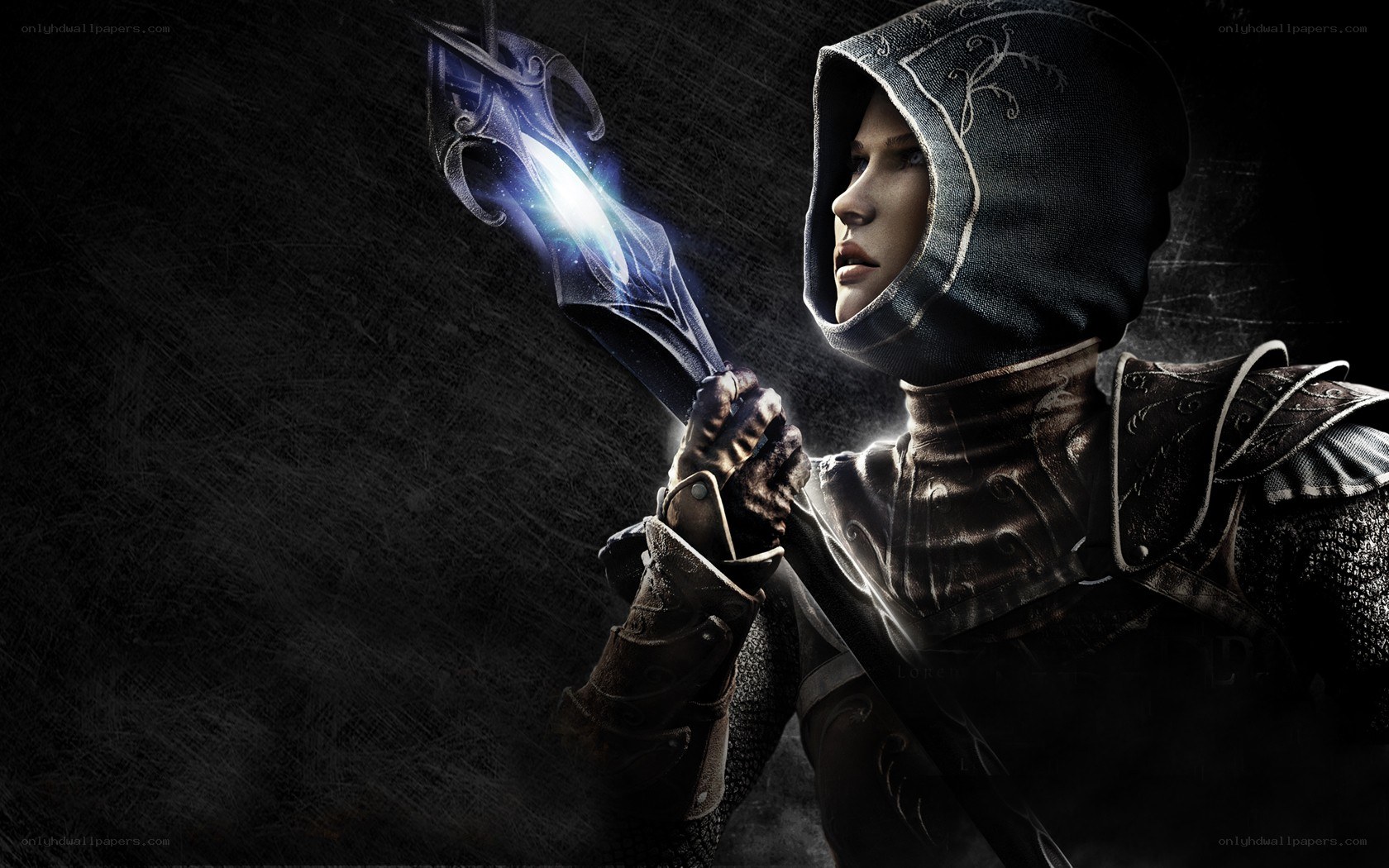 hooded mage with glowing staff