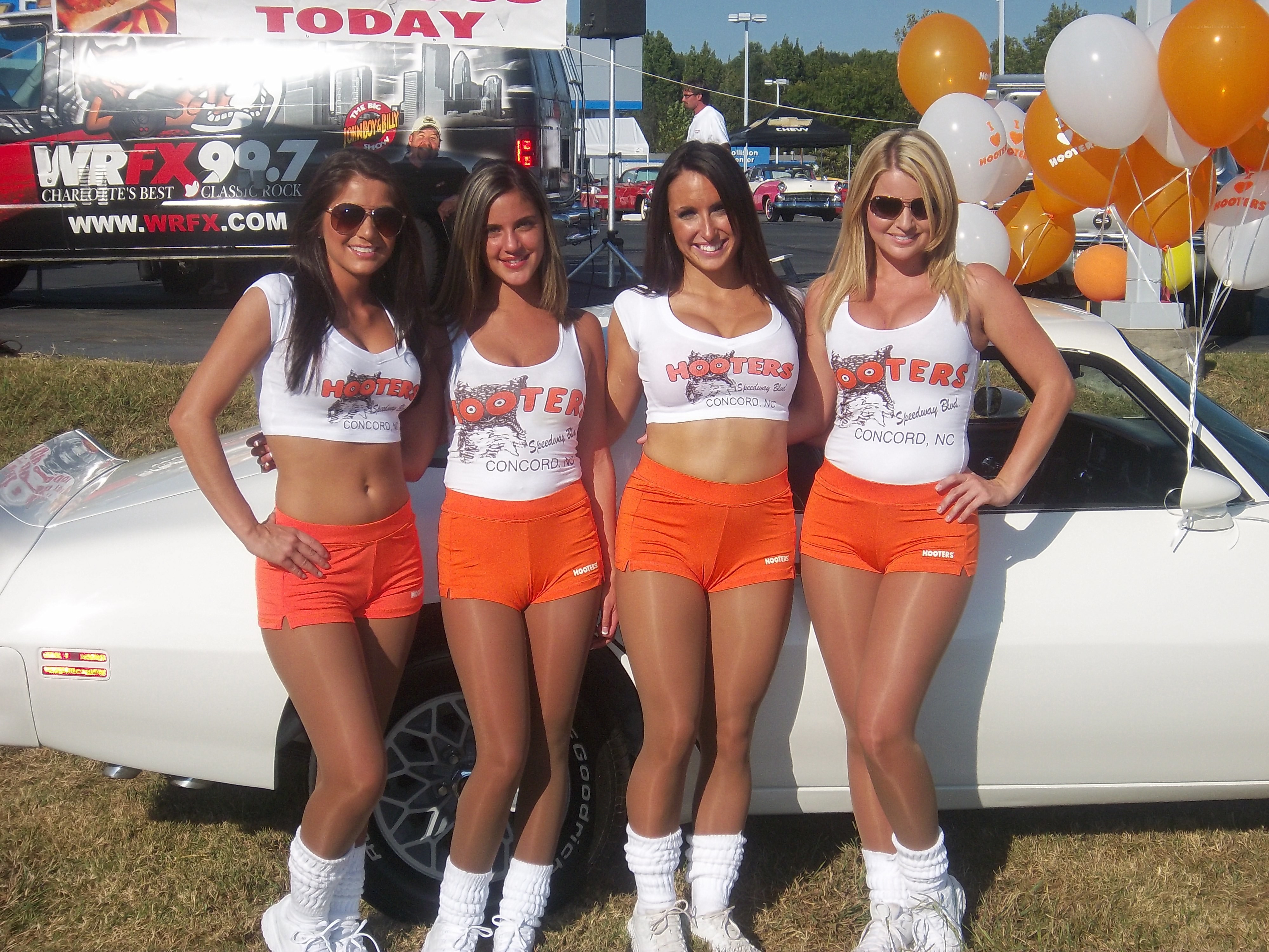 Hooters models at car event