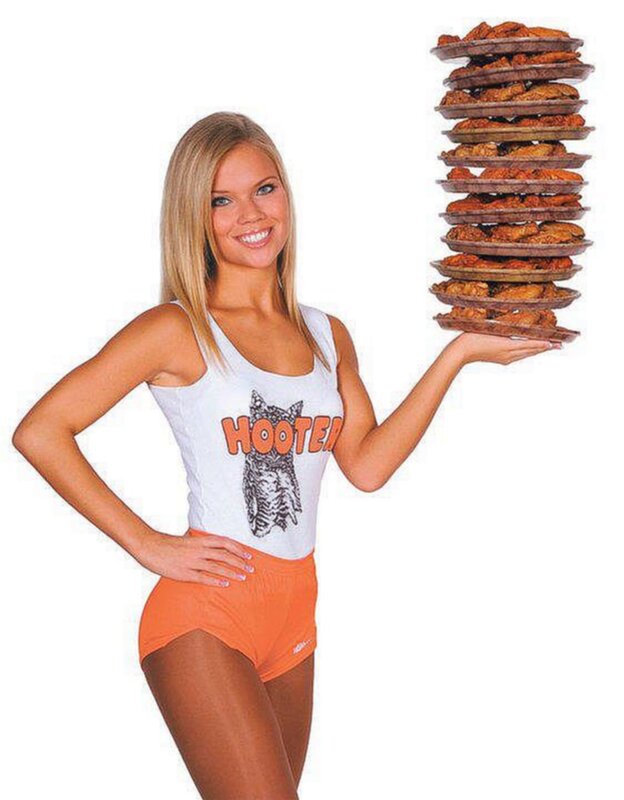 Hooters server with chicken stack