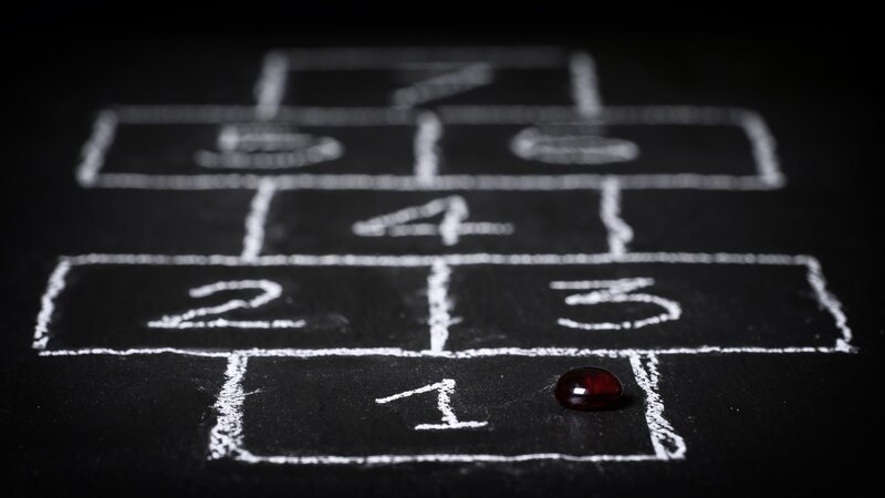 Hopscotch Grid with Red Stone