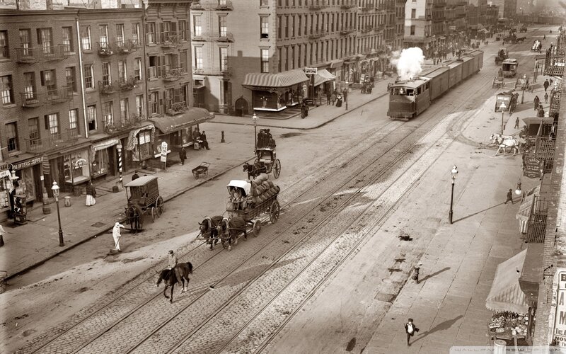 Horse-drawn Wagons on Street