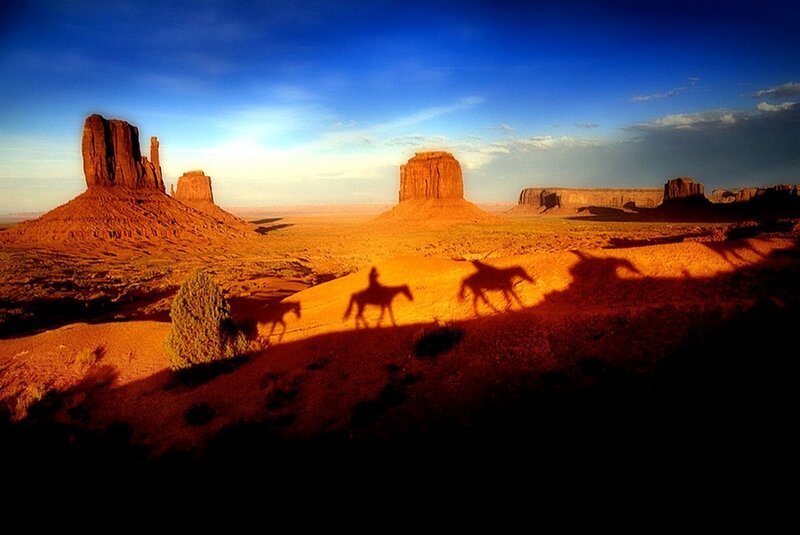 Horseback riders in desert