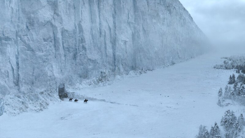 Horsemen near ice wall