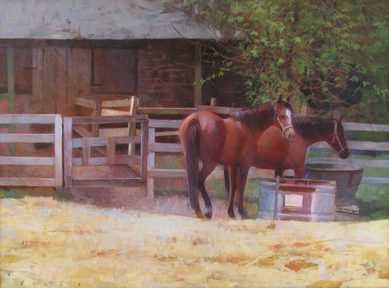 Horses in a barnyard