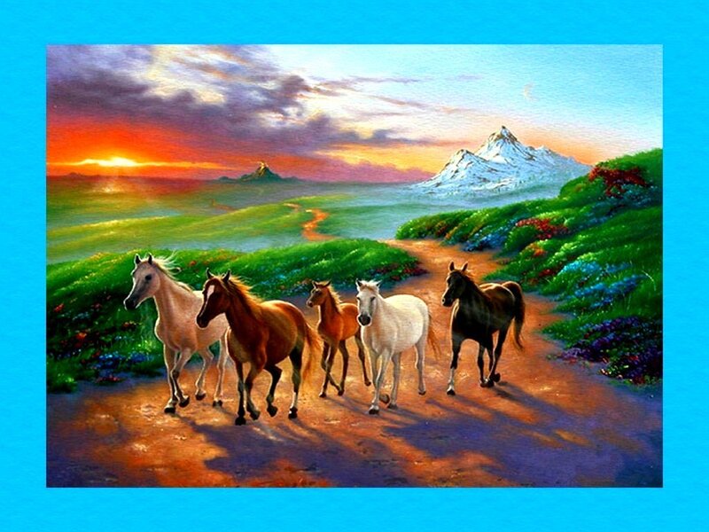 Horses on a path at sunset