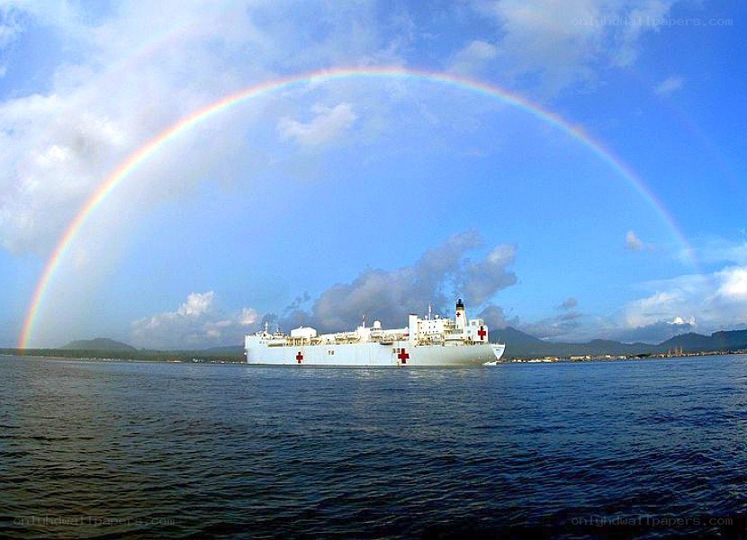 Hospital ship under rainbow