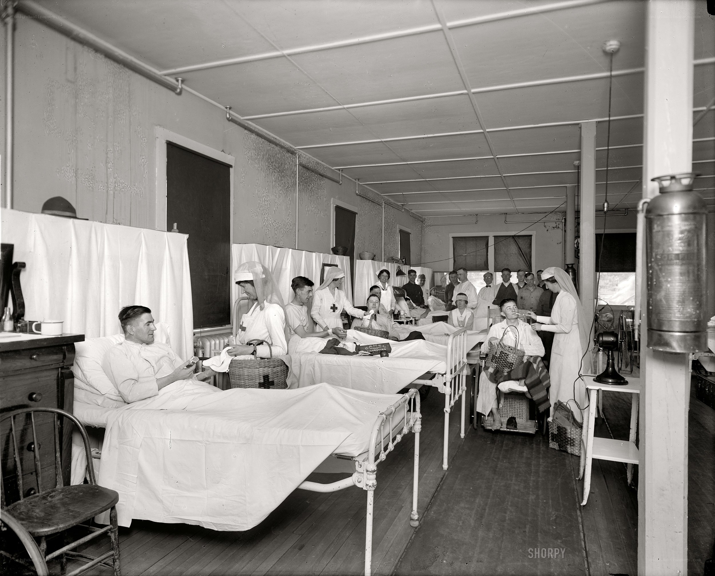 Hospital ward with nurses and patients