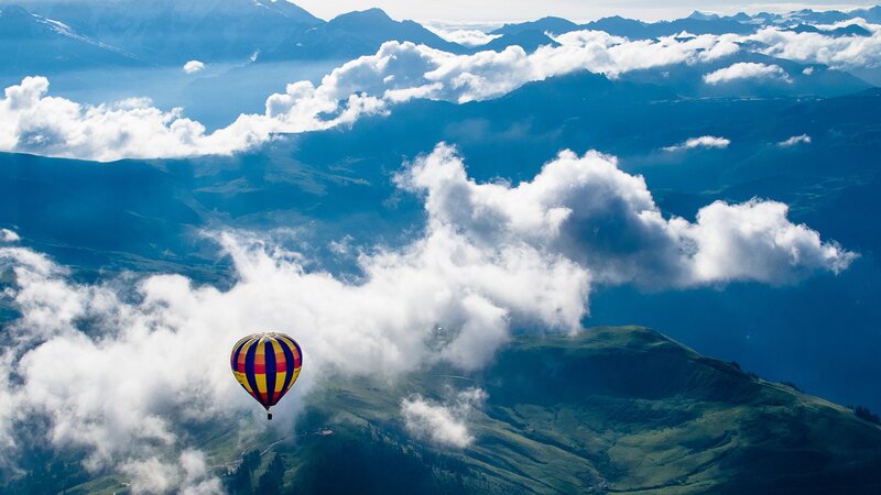 Hot Air Balloon in Mountains — Blue