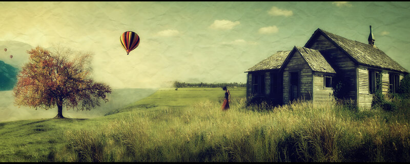Hot air balloon over a rural landscape
