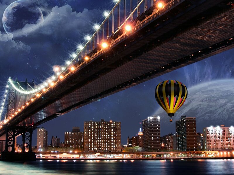 Hot air balloon over city bridge