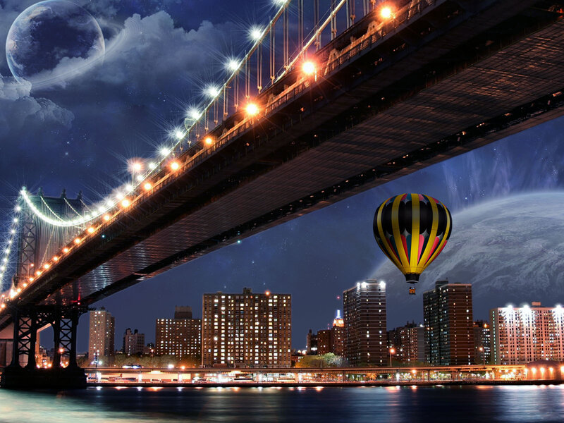 Hot air balloon over city bridge