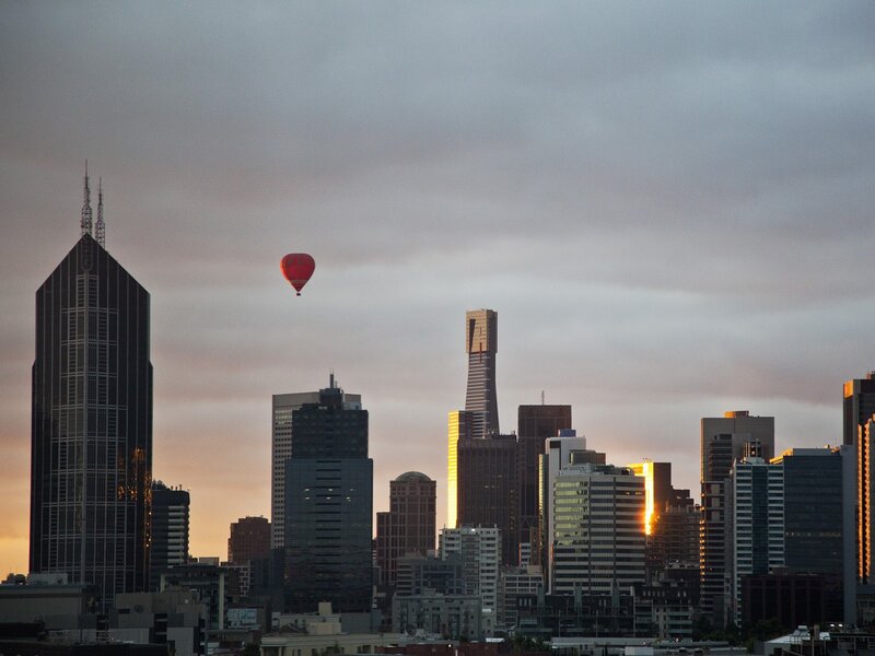 Hot Air Balloon over City — Gray