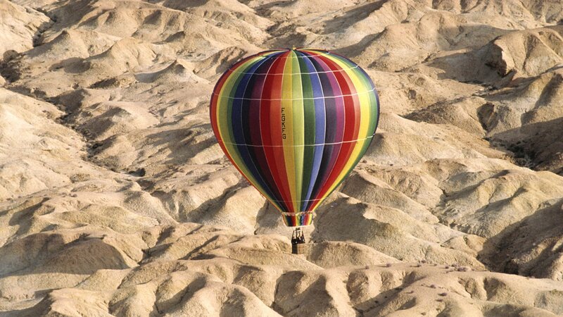 Hot air balloon over desert