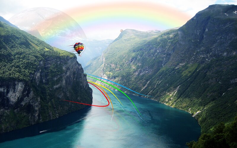 Hot air balloon over fjord