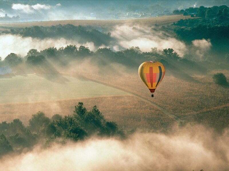 Hot Air Balloon over Fog — Yellow