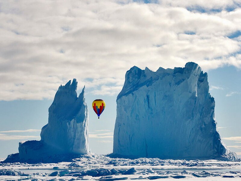 Hot Air Balloon over Icebergs