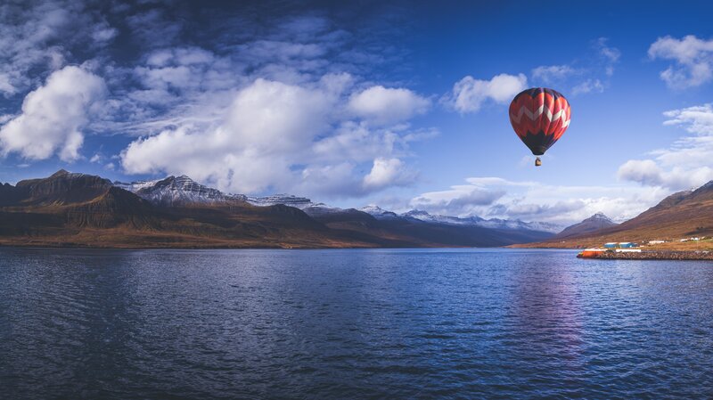 Hot Air Balloon over Lake — Blue, Serene, Afternoon, Photograph