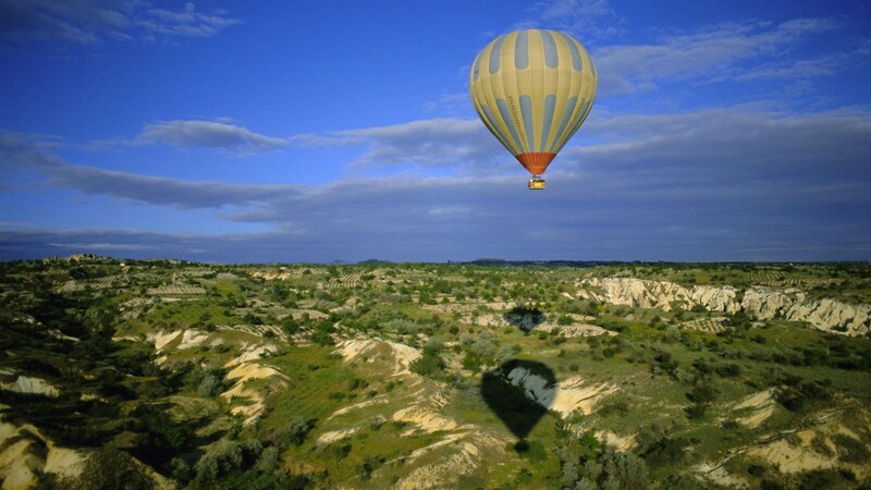Hot Air Balloon over Landscape — Blue