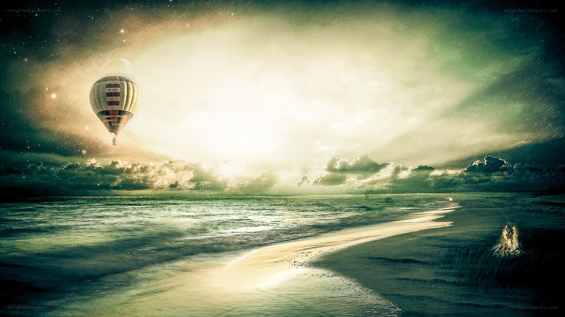 Hot air balloon over ocean