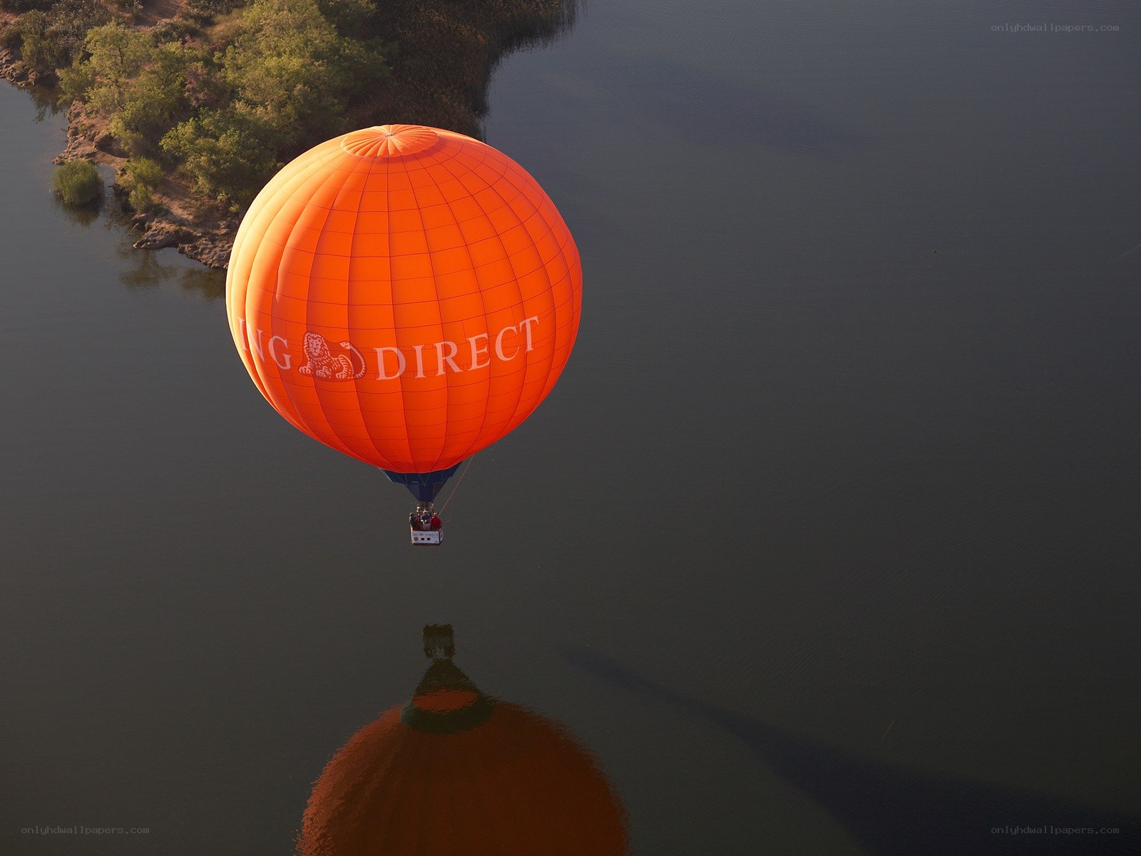 Hot air balloon over river