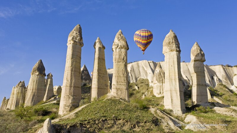 Hot Air Balloon over Rock Formations — Blue