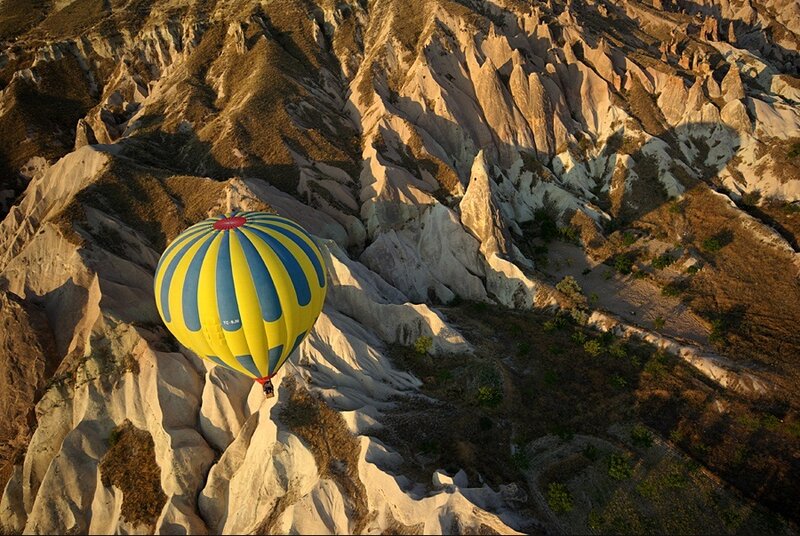 Hot Air Balloon over Rocks