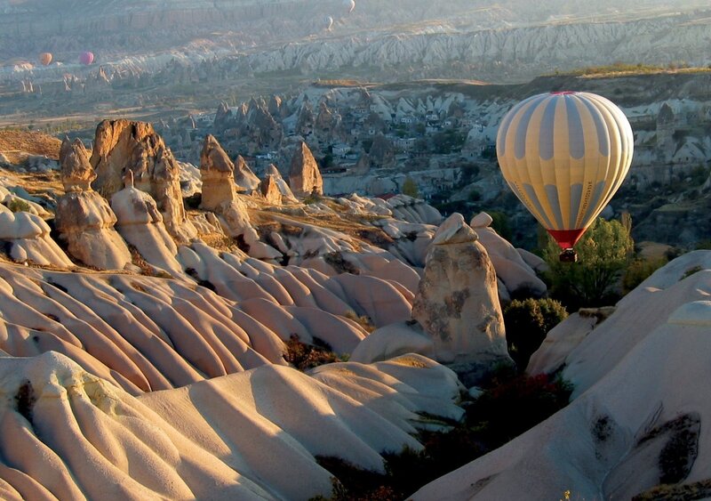Hot Air Balloon over Rocks — White