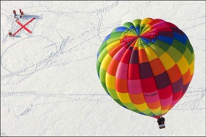 Hot air balloon over snow