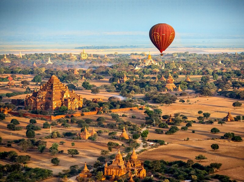 Hot Air Balloon over Temples — Brown