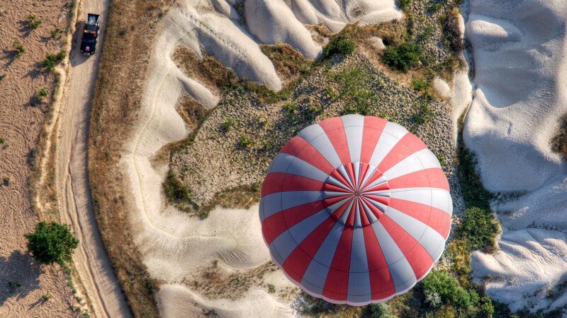 Hot Air Balloon over Terrain