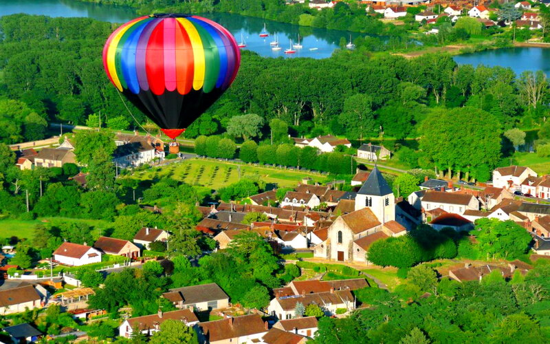 Hot Air Balloon over Village — Green