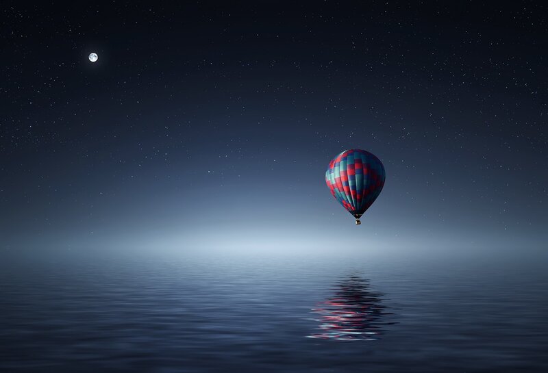 Hot Air Balloon over Water — Blue, Serene, Night
