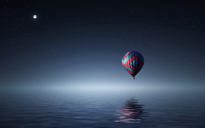 Hot Air Balloon over Water — Blue, Serene