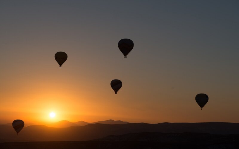 Hot Air Balloons at Sunrise — Orange, Serene