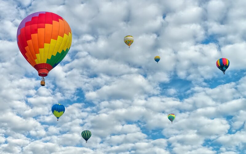 Hot Air Balloons in Sky — Blue, Serene, Afternoon, Photograph, Clouds