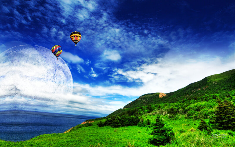 Hot air balloons over a dreamy landscape
