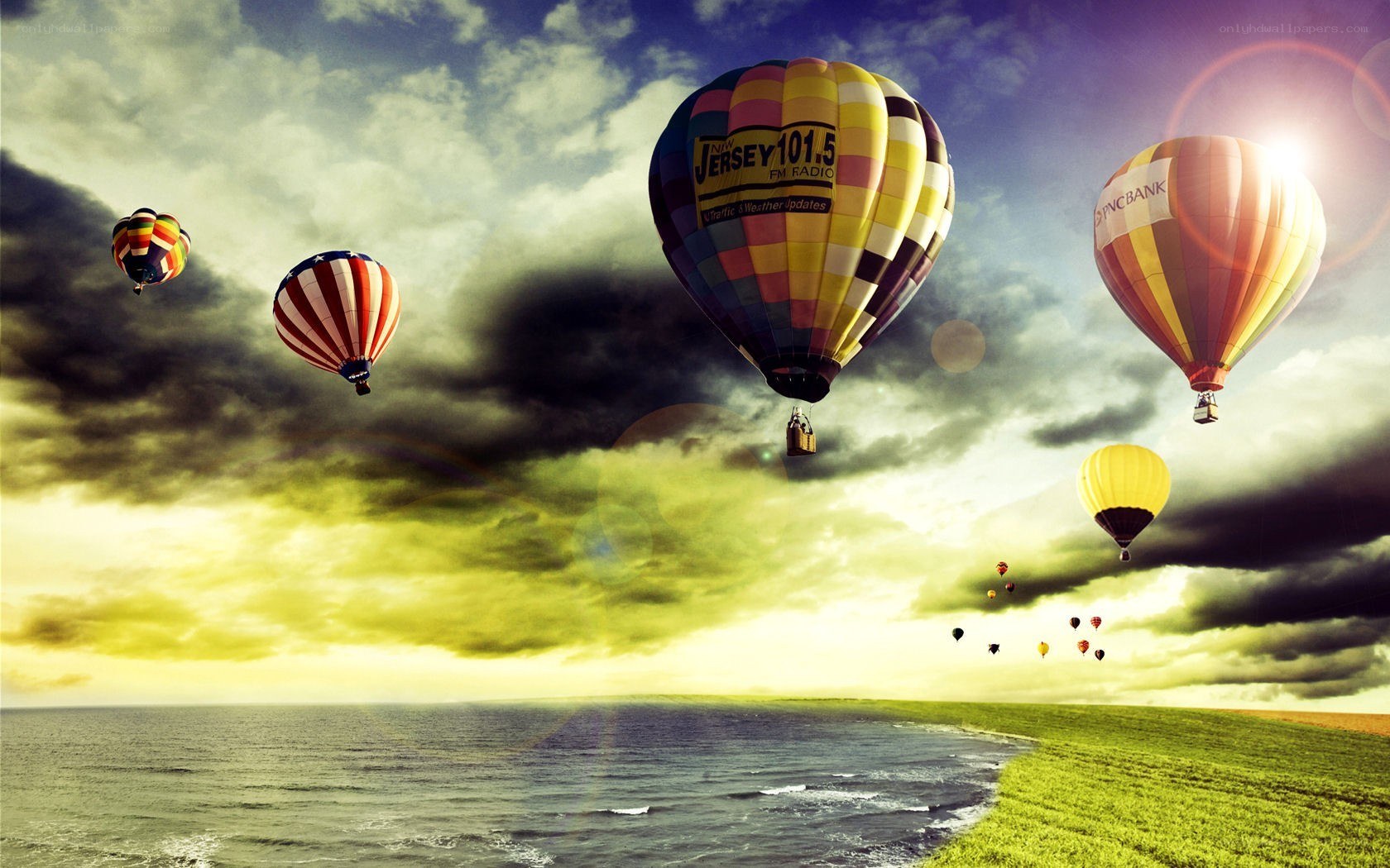 Hot air balloons over coast