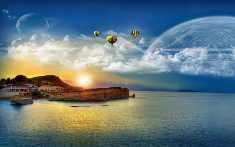 Hot air balloons over coastal sunset