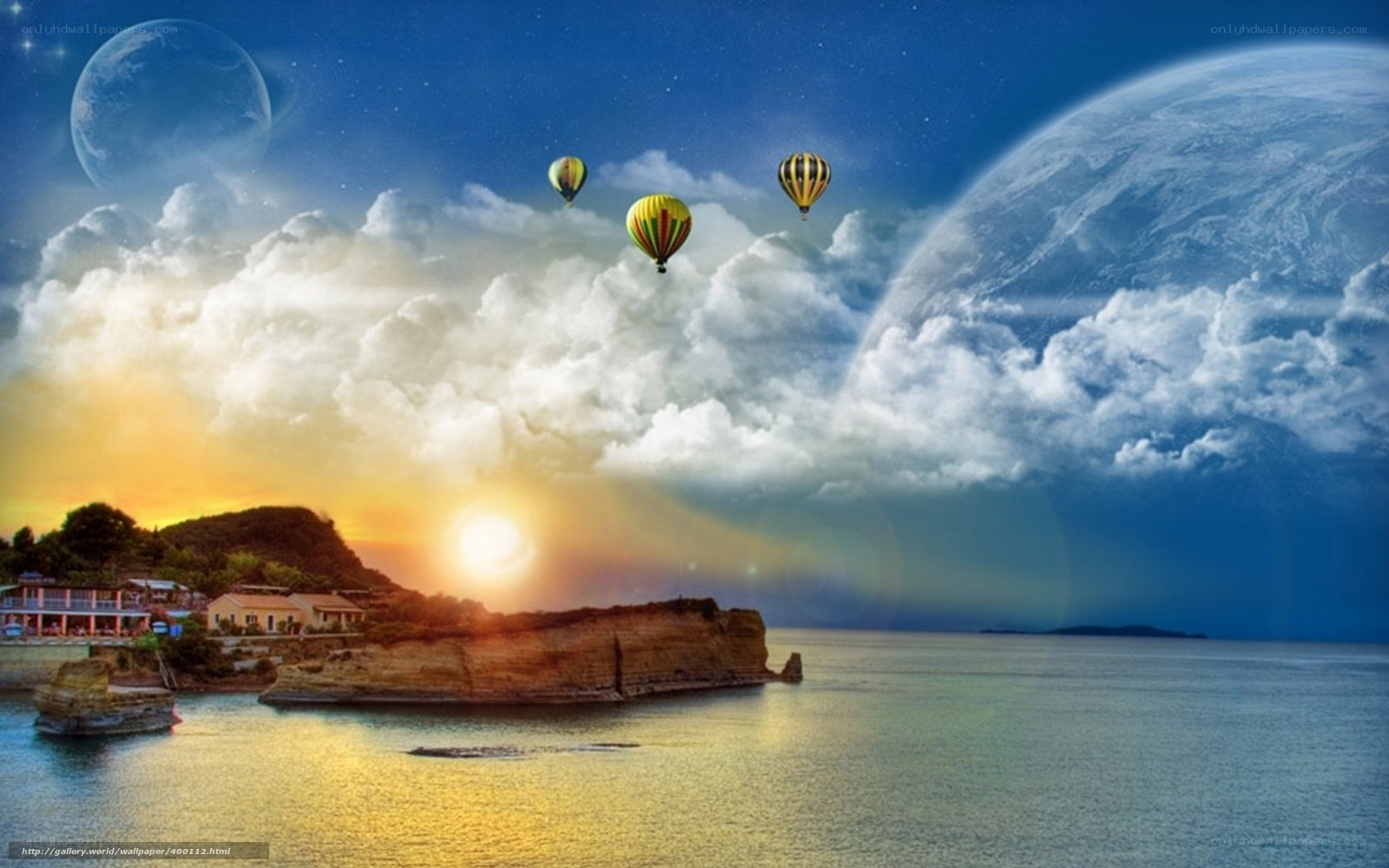 Hot air balloons over coastal town