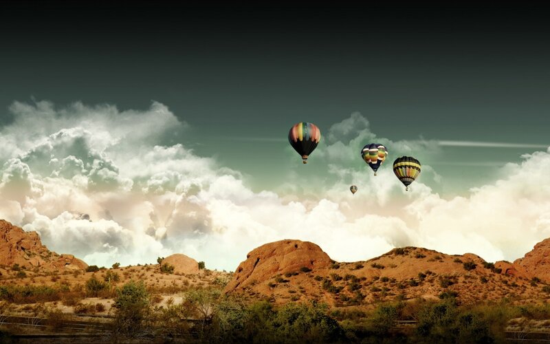 Hot air balloons over desert