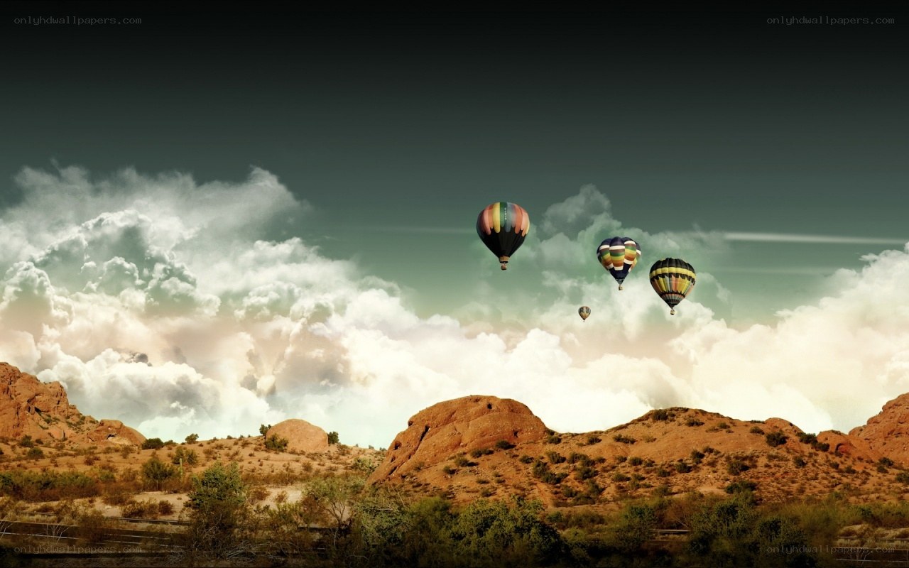 Hot air balloons over desert