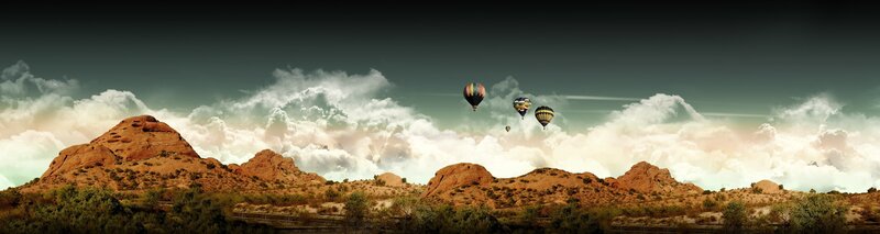 Hot air balloons over desert