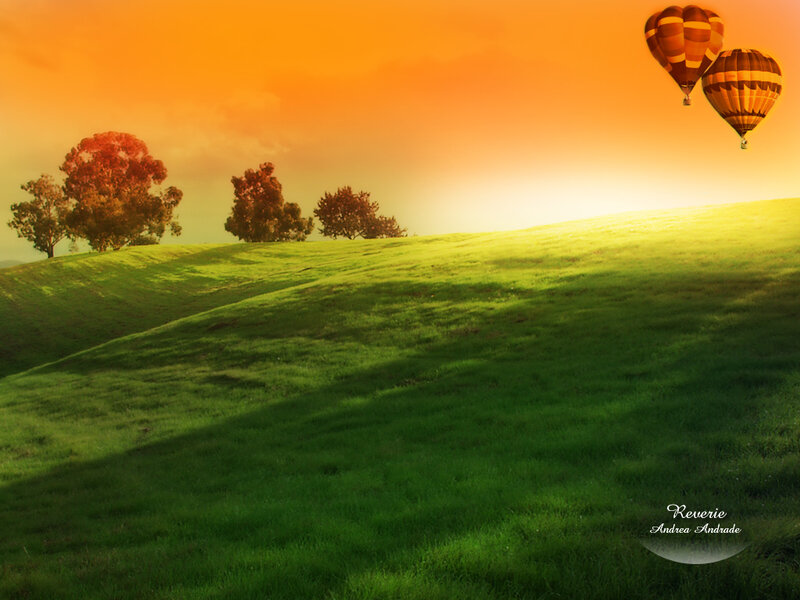 Hot air balloons over green hills