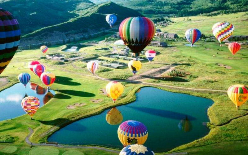 Hot Air Balloons over Lake — Green, Serene
