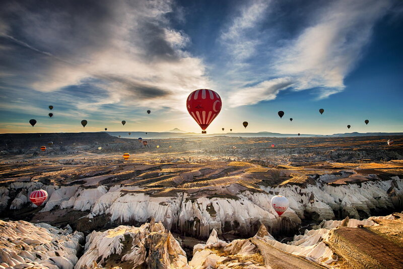 Hot Air Balloons over Landscape — Blue, Dramatic