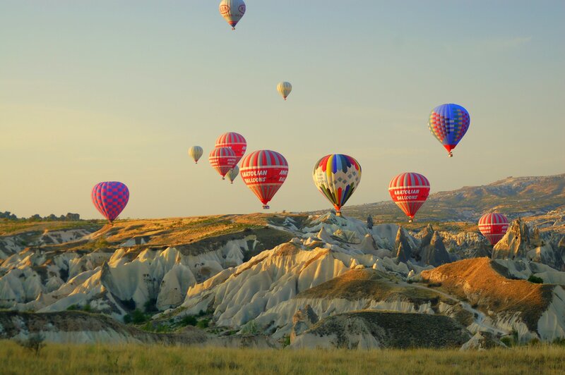 Hot Air Balloons over Landscape — Blue, Serene